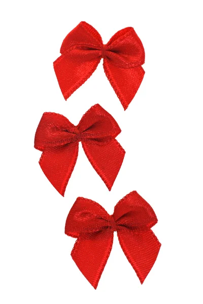 3 つの赤の装飾的な弓 — ストック写真