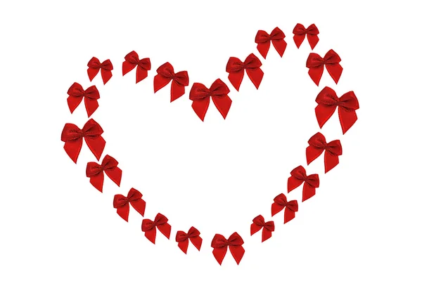Красные декоративные луки в форме сердца — стоковое фото
