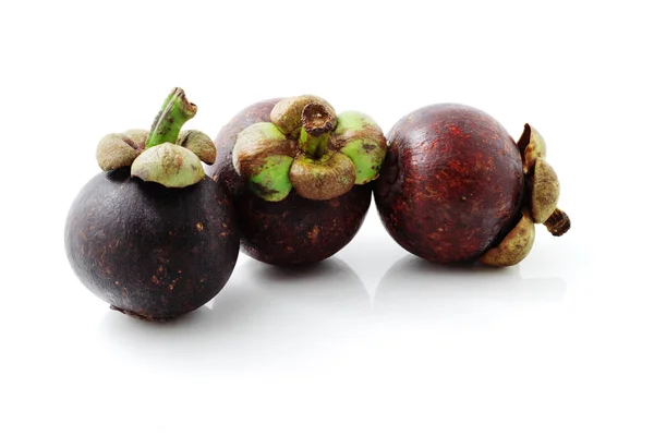Three fresh mangosteens — Stock Photo, Image