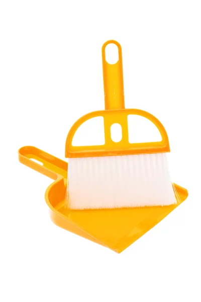 Sartén y cepillo de plástico en amarillo — Foto de Stock