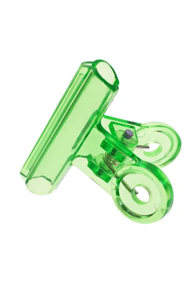 Grüne Plastikbüroklammer — Stockfoto
