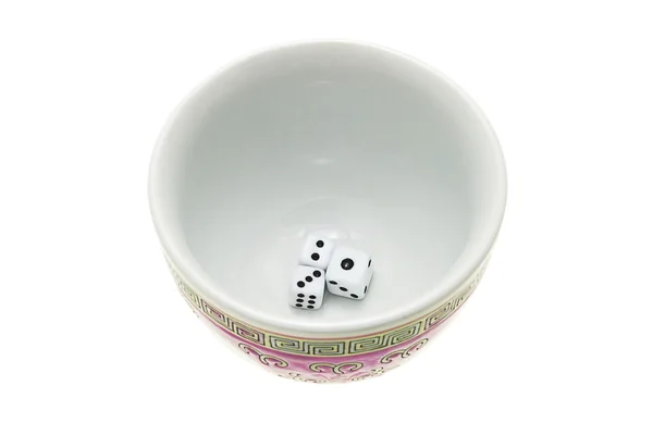 Dice in Chinese traditional tea cup — Zdjęcie stockowe