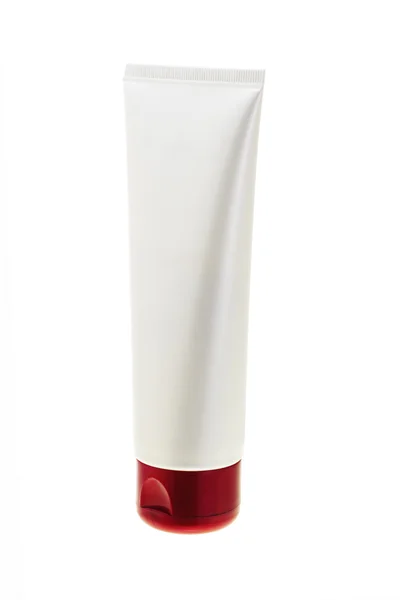 Creamy white cosmetic tube — Stock Photo, Image