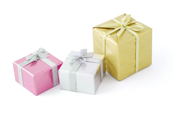 Три подарункові коробки — стокове фото