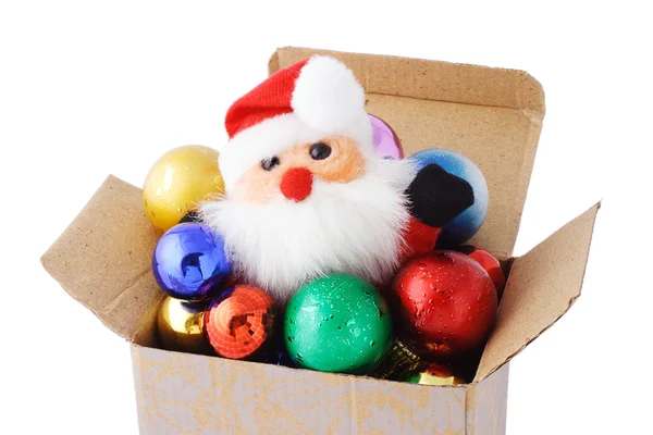 Babbo Natale e palline decorative in confezione regalo — Foto Stock