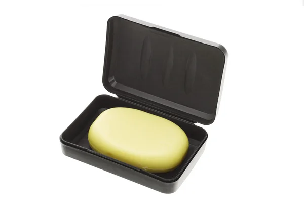 Bar of soap in black box — Stock Photo, Image