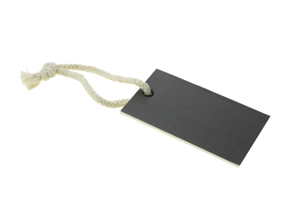 Black blank cardboard paper label — Stok fotoğraf