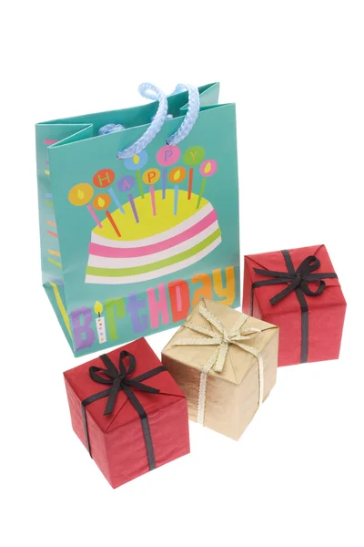 Birthday party bag and gift boxes — Stock Photo, Image