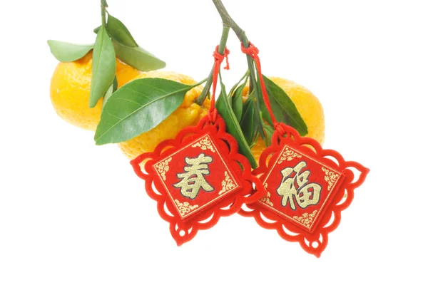 Ornamento decorativo chinês e laranjas mandarina — Fotografia de Stock