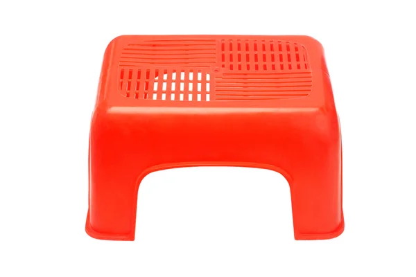 Mini czerwony stolec z tworzyw sztucznych — Zdjęcie stockowe