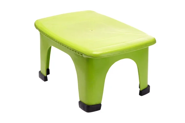 Zelená plastová stolička — Stock fotografie