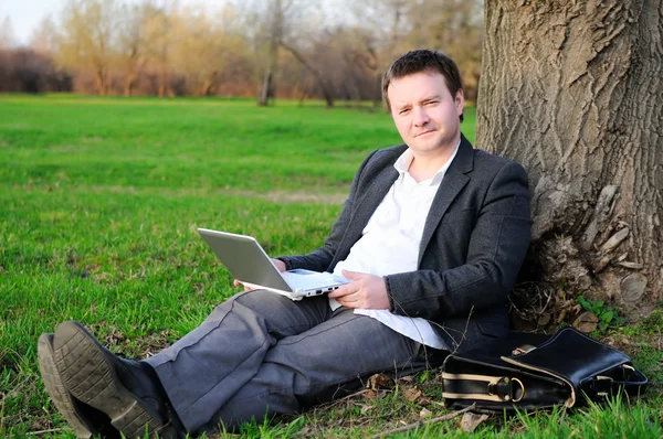 stock image Businessman with laptop