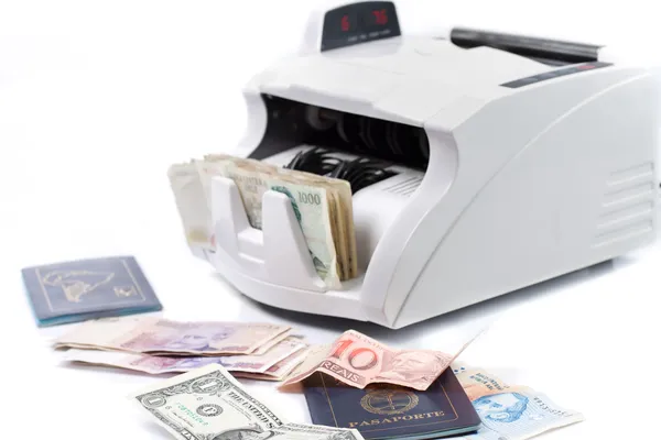 stock image Electronic money counter and passport