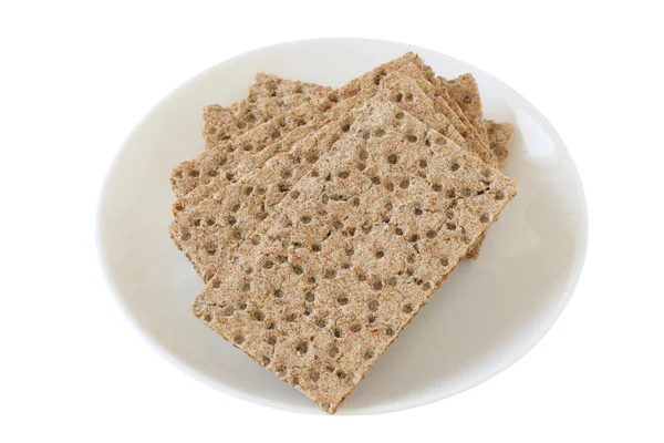 Crackerek, tányéron — Stock Fotó