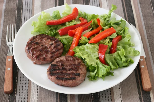 Hamburgers with salad — Stock Photo, Image