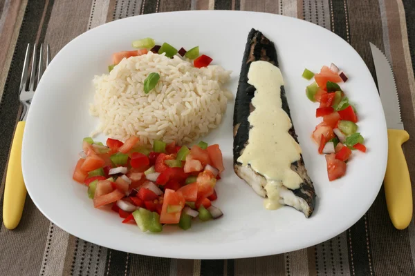 Swordfish with sauce and rice — Stock Photo, Image