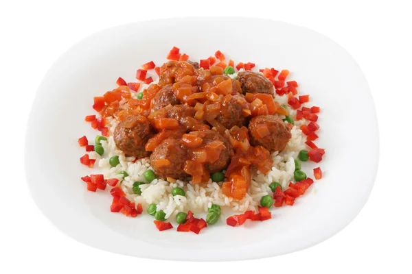 stock image Meatballs with rice with peas