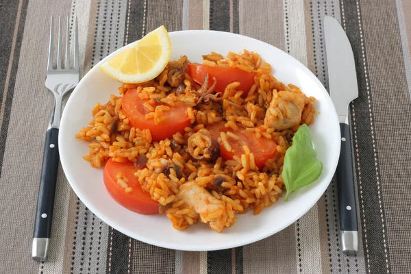 Rice with seafood and lemon — Stock Photo, Image