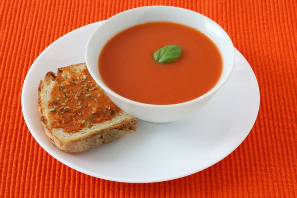 Tomato soup with bread — Stock Photo, Image