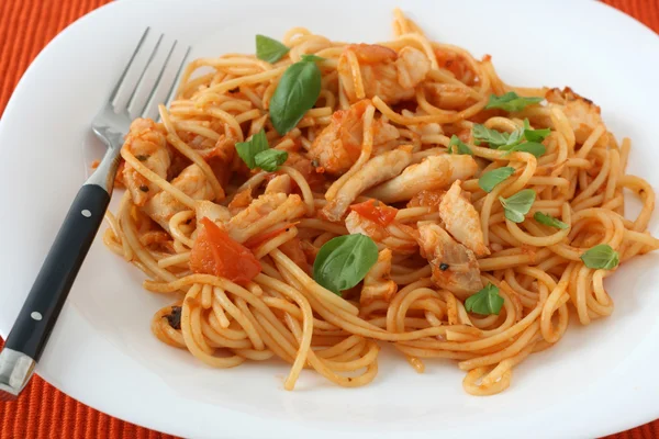 Spaghetti with fish and sauce — Stock Photo, Image