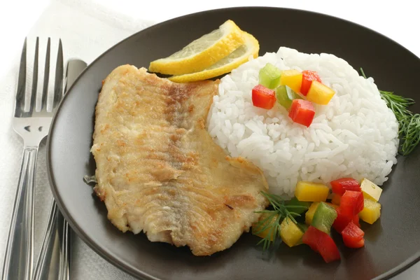 Fried fish with boiled rice — Stock Photo, Image