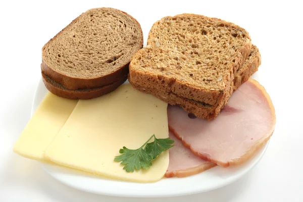 Bread with ham and cheese — Stock Photo, Image
