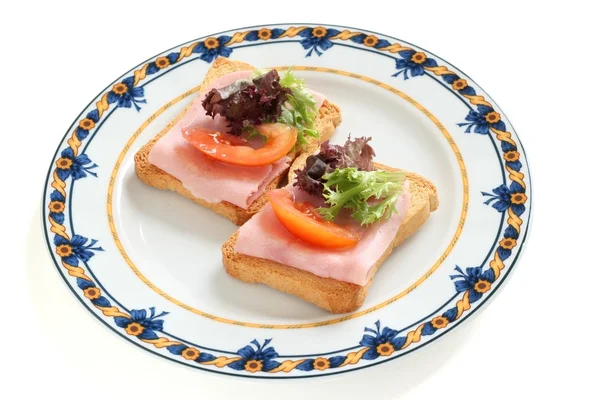 Toasts with ham — Stock Photo, Image