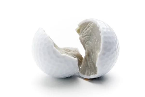 Bola de golfe partida — Fotografia de Stock