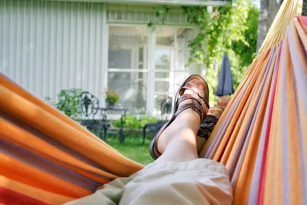 Relaxing in a hammock — Stock Photo, Image