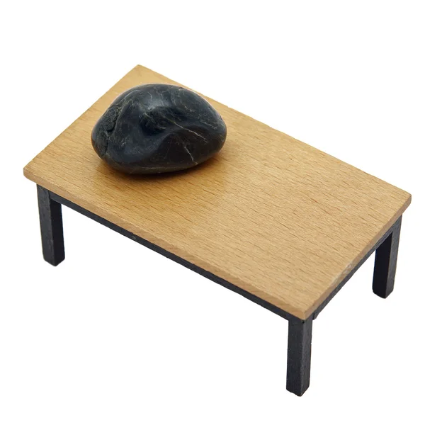 Stein auf einem Tisch — Stockfoto