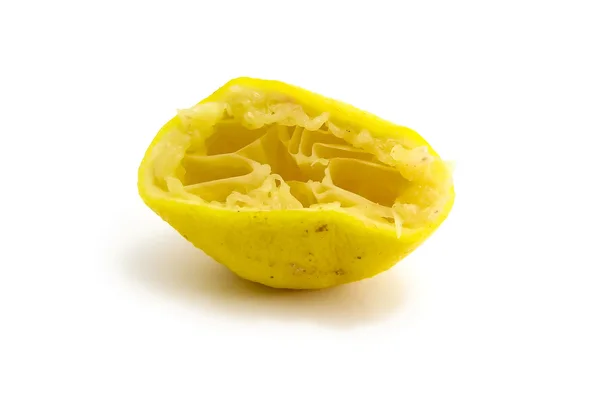 Squeezed lemon isolated on white background — Stock Photo, Image