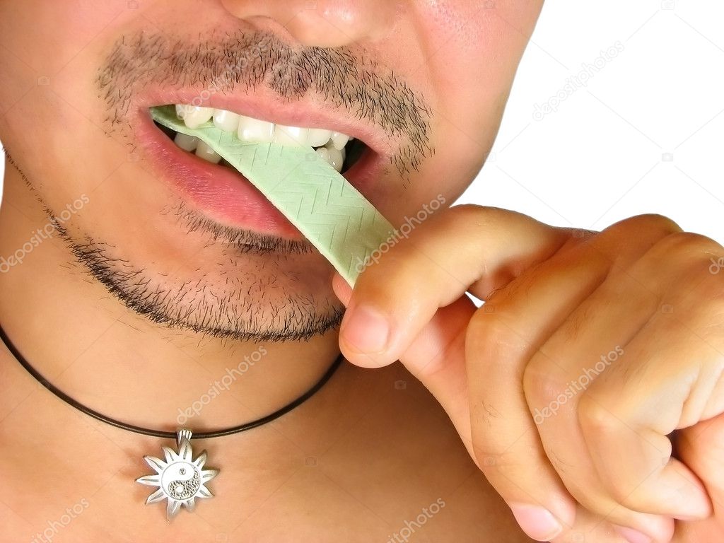 Closeup of man with chewing gum