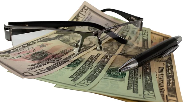 Pengar, penna, glasögon på vit bakgrund — Stockfoto