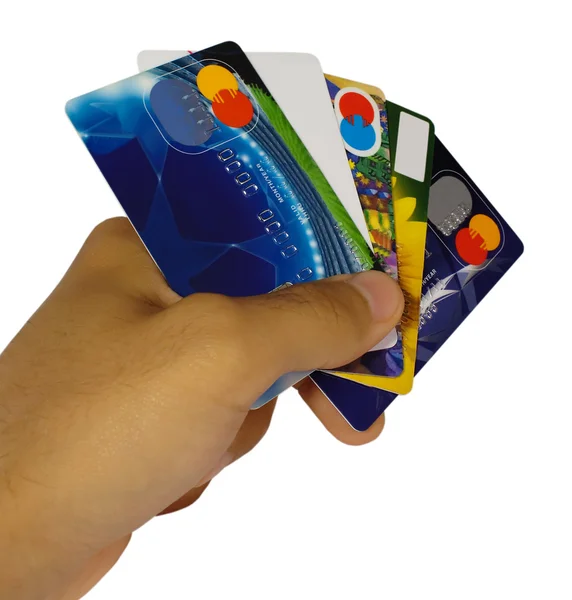 Homme main tenant des cartes de crédit isolé — Photo