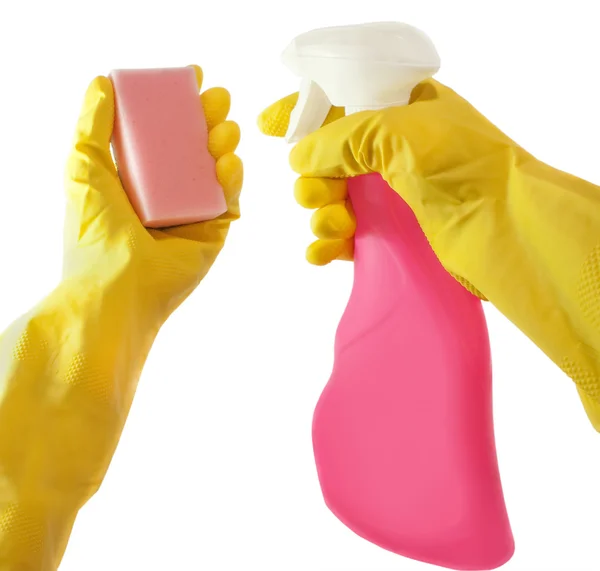 Mãos em luvas amarelas segurar pulverizador e esponja, isolado — Fotografia de Stock