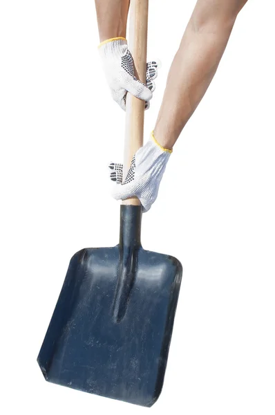Hands in gloves holding a shovel, isolated — Stock Photo, Image