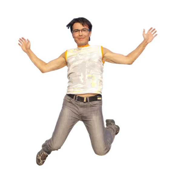Glücklicher junger Mann springt isoliert in die Luft — Stockfoto