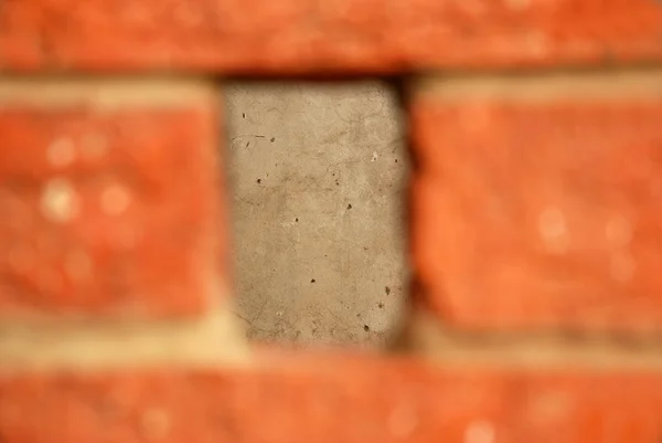 Space behind brick wall — Stock Photo, Image