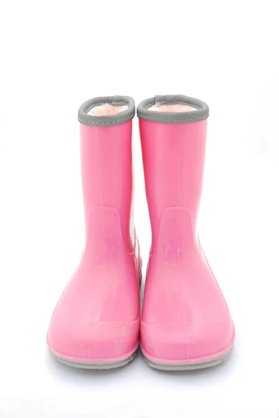 Рожевий гумки чоботи — стокове фото
