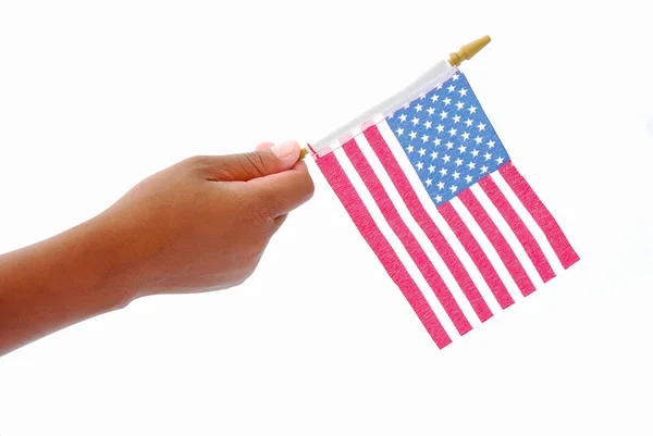 Американский флаг в чёрной руке — стоковое фото