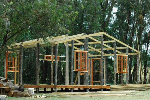 Wooden house in construction — Stock Photo, Image