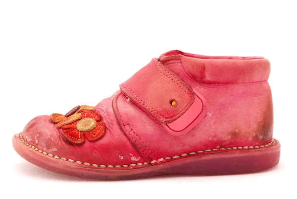Zapato bebé rosa sobre blanco — Foto de Stock