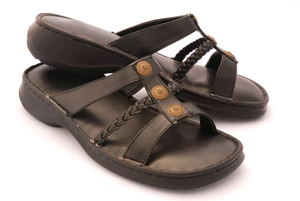 Svarta sandalerčerné sandály — Stockfoto