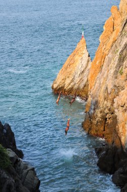 Acapulco cliffs divers clipart