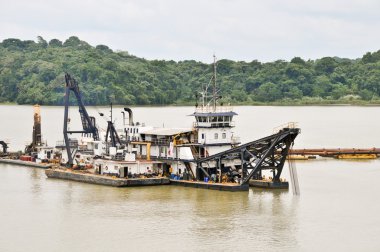 Dredge working in the Panama Canal clipart