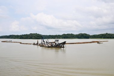 Dredge clears the Panama Canal clipart