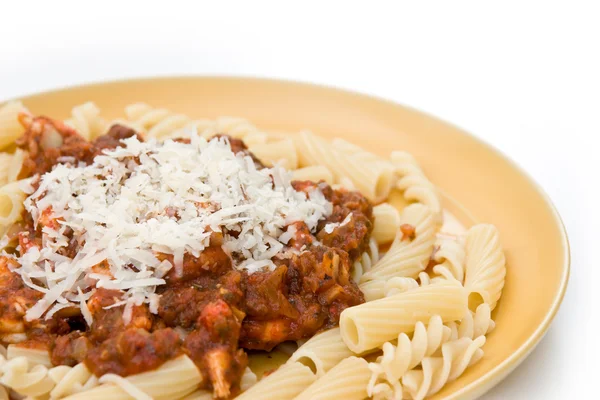 stock image Pasta and tomatosauce with parmesan on top