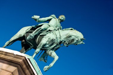 Statue outside the norwegian castle clipart