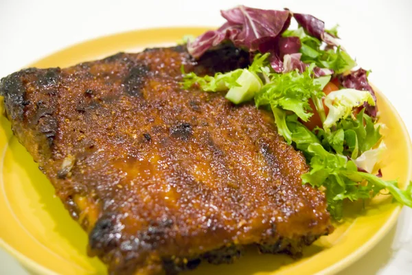 stock image Spare ribs and salad