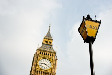 Big Ben with taxi sign clipart